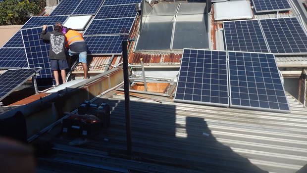 Installing solar panels.